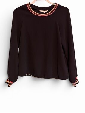 Trina Turk Black blouse with colorful striped cuffs and neckline